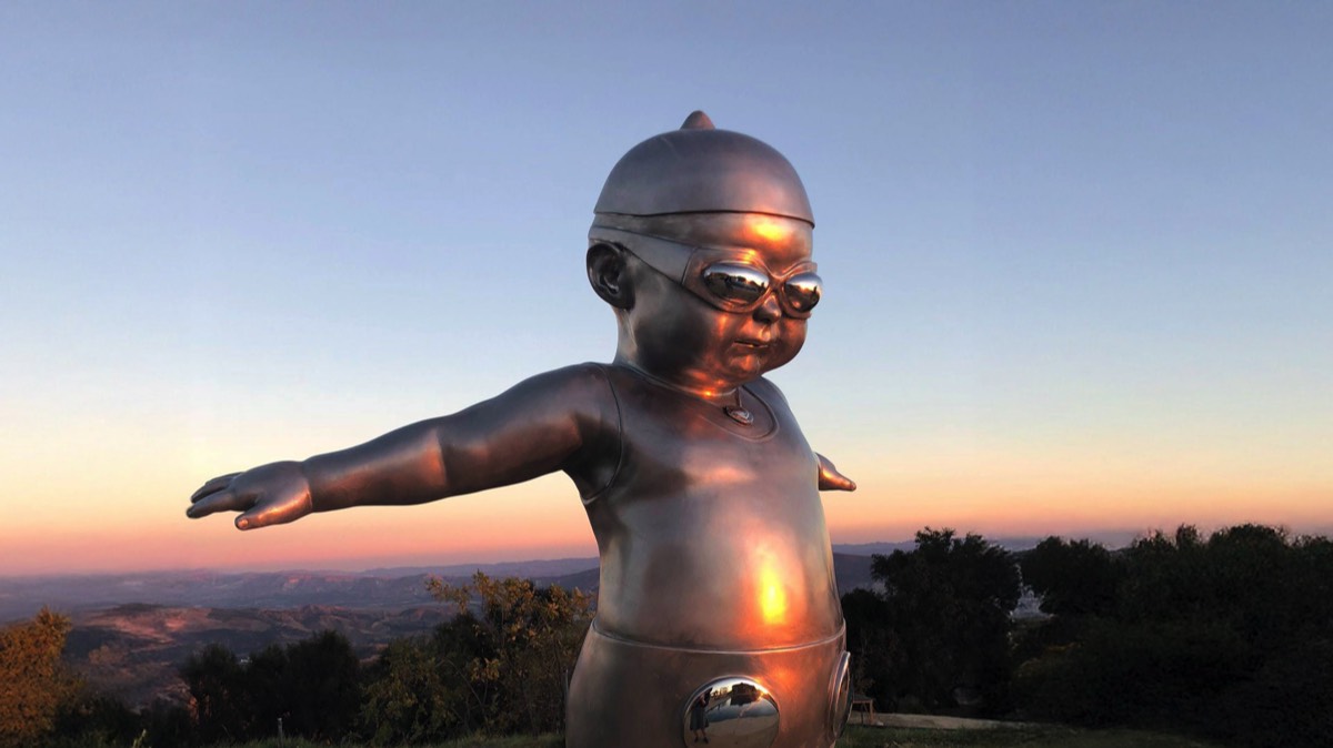 King Tot stainless steel figure sculpture in Los Angeles by Richard Becker