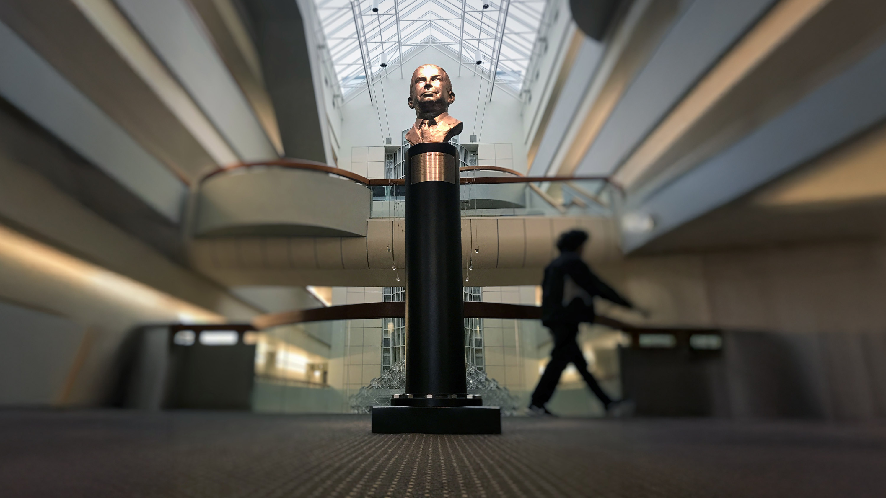 Monumental stainless steel sculpture of L.S. Sam Skaggs at Scripps Research, La Jolla by Richard Becker FNSS