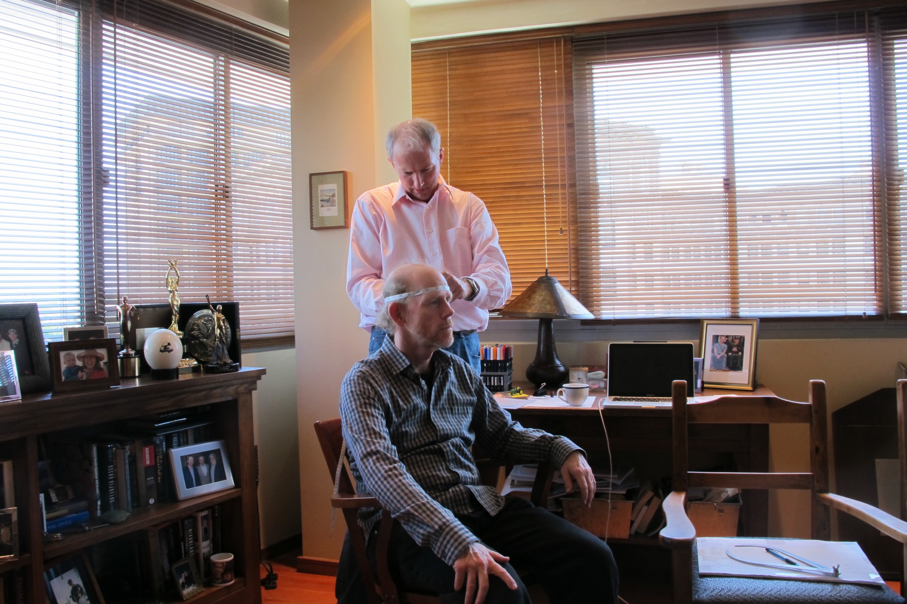 Director Ron Howard being measured by sculptor Richard Becker for Hall of Fame Bust. Imagine Entertainment, Beverly Hills